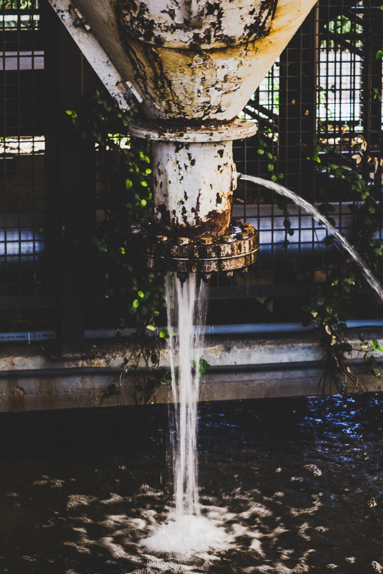 Water spraying from a broken pipe fitting